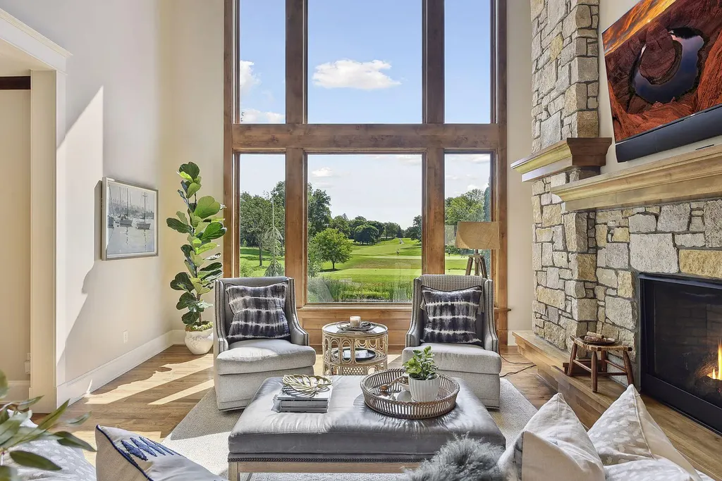 10 Myrtlewood Road Home in Wayzata, Minnesota. This magnificent custom-built home is a true masterpiece, perfectly blending sophistication and luxury with everyday comfort and warmth. From the moment you step inside, you'll be captivated by the quality and unique features that define this exceptional residence.