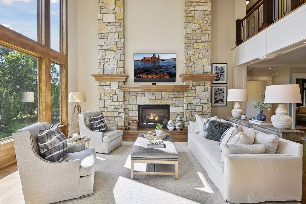 10 Myrtlewood Road Home in Wayzata, Minnesota. This magnificent custom-built home is a true masterpiece, perfectly blending sophistication and luxury with everyday comfort and warmth. From the moment you step inside, you'll be captivated by the quality and unique features that define this exceptional residence.