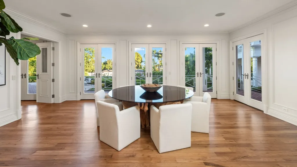 10250 West Sunset Boulevard Home in Los Angeles, California. Discover the epitome of luxury living at this meticulously reimagined Paul Williams designed estate in Holmby Hills, spanning approximately 2.8 acres. Comprising three structures with nearly 30,000 SF of living space, this world-class property offers unrivaled privacy, an expansive motor court, 14 bedrooms, 25 baths, and an array of amenities including a theater, game room, and a wellness-focused pool house. 