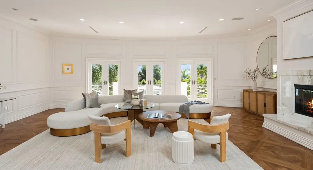 10250 West Sunset Boulevard Home in Los Angeles, California. Discover the epitome of luxury living at this meticulously reimagined Paul Williams designed estate in Holmby Hills, spanning approximately 2.8 acres. Comprising three structures with nearly 30,000 SF of living space, this world-class property offers unrivaled privacy, an expansive motor court, 14 bedrooms, 25 baths, and an array of amenities including a theater, game room, and a wellness-focused pool house. 
