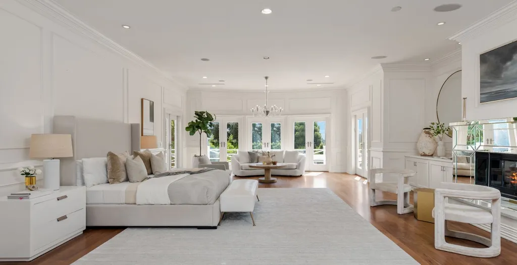 10250 West Sunset Boulevard Home in Los Angeles, California. Discover the epitome of luxury living at this meticulously reimagined Paul Williams designed estate in Holmby Hills, spanning approximately 2.8 acres. Comprising three structures with nearly 30,000 SF of living space, this world-class property offers unrivaled privacy, an expansive motor court, 14 bedrooms, 25 baths, and an array of amenities including a theater, game room, and a wellness-focused pool house. 