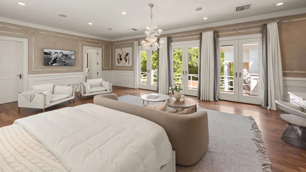 10250 West Sunset Boulevard Home in Los Angeles, California. Discover the epitome of luxury living at this meticulously reimagined Paul Williams designed estate in Holmby Hills, spanning approximately 2.8 acres. Comprising three structures with nearly 30,000 SF of living space, this world-class property offers unrivaled privacy, an expansive motor court, 14 bedrooms, 25 baths, and an array of amenities including a theater, game room, and a wellness-focused pool house. 