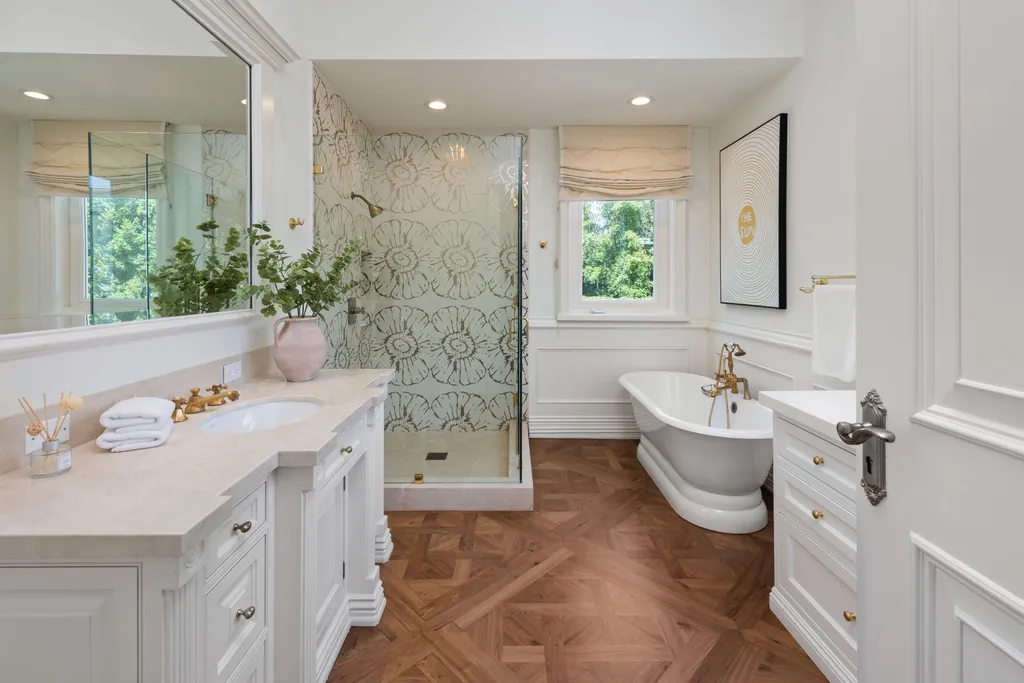 10250 West Sunset Boulevard Home in Los Angeles, California. Discover the epitome of luxury living at this meticulously reimagined Paul Williams designed estate in Holmby Hills, spanning approximately 2.8 acres. Comprising three structures with nearly 30,000 SF of living space, this world-class property offers unrivaled privacy, an expansive motor court, 14 bedrooms, 25 baths, and an array of amenities including a theater, game room, and a wellness-focused pool house. 