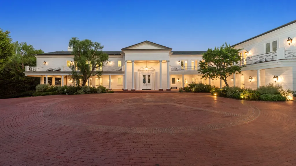 10250 West Sunset Boulevard Home in Los Angeles, California. Discover the epitome of luxury living at this meticulously reimagined Paul Williams designed estate in Holmby Hills, spanning approximately 2.8 acres. Comprising three structures with nearly 30,000 SF of living space, this world-class property offers unrivaled privacy, an expansive motor court, 14 bedrooms, 25 baths, and an array of amenities including a theater, game room, and a wellness-focused pool house. 