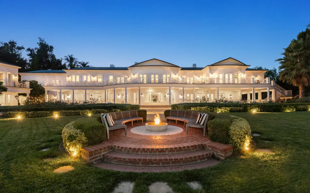 10250 West Sunset Boulevard Home in Los Angeles, California. Discover the epitome of luxury living at this meticulously reimagined Paul Williams designed estate in Holmby Hills, spanning approximately 2.8 acres. Comprising three structures with nearly 30,000 SF of living space, this world-class property offers unrivaled privacy, an expansive motor court, 14 bedrooms, 25 baths, and an array of amenities including a theater, game room, and a wellness-focused pool house. 