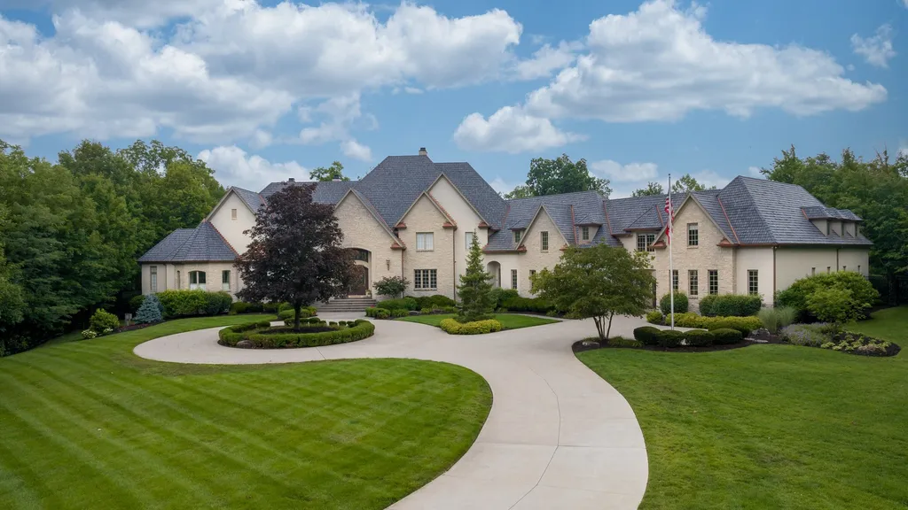 11101 Hawthorn Ridge Home in Fishers, Indiana. Explore the breathtaking elegance of 11101 Hawthorn Ridge, a custom-designed estate in Hamilton Proper. Nestled on over 6 acres of meticulously landscaped grounds, this gated residence offers unparalleled privacy and sophistication.