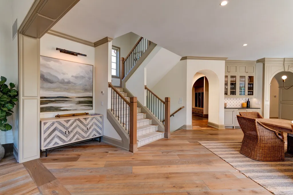 11101 Hawthorn Ridge Home in Fishers, Indiana. Explore the breathtaking elegance of 11101 Hawthorn Ridge, a custom-designed estate in Hamilton Proper. Nestled on over 6 acres of meticulously landscaped grounds, this gated residence offers unparalleled privacy and sophistication.