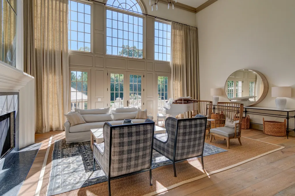 11101 Hawthorn Ridge Home in Fishers, Indiana. Explore the breathtaking elegance of 11101 Hawthorn Ridge, a custom-designed estate in Hamilton Proper. Nestled on over 6 acres of meticulously landscaped grounds, this gated residence offers unparalleled privacy and sophistication.