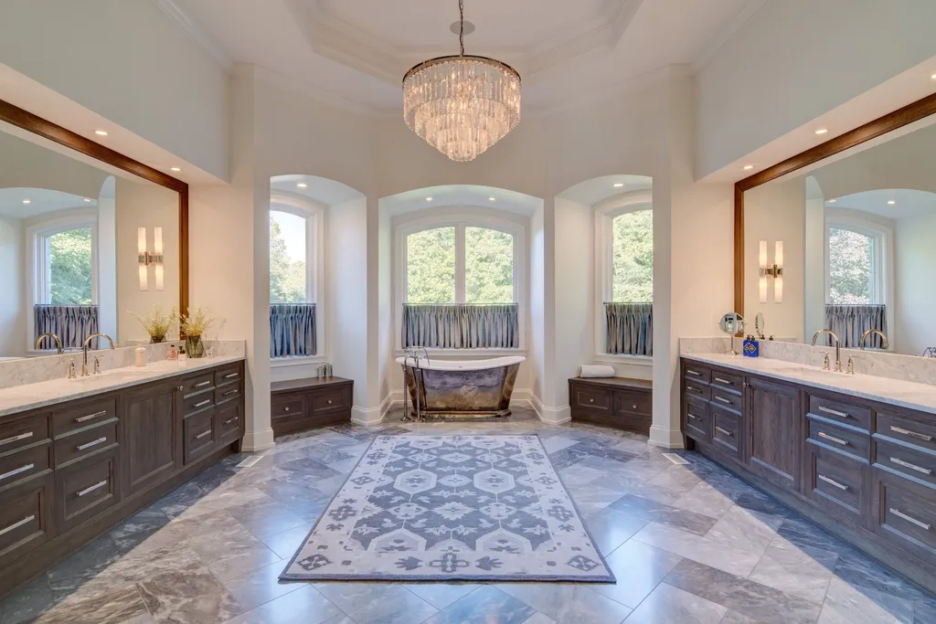 11101 Hawthorn Ridge Home in Fishers, Indiana. Explore the breathtaking elegance of 11101 Hawthorn Ridge, a custom-designed estate in Hamilton Proper. Nestled on over 6 acres of meticulously landscaped grounds, this gated residence offers unparalleled privacy and sophistication.