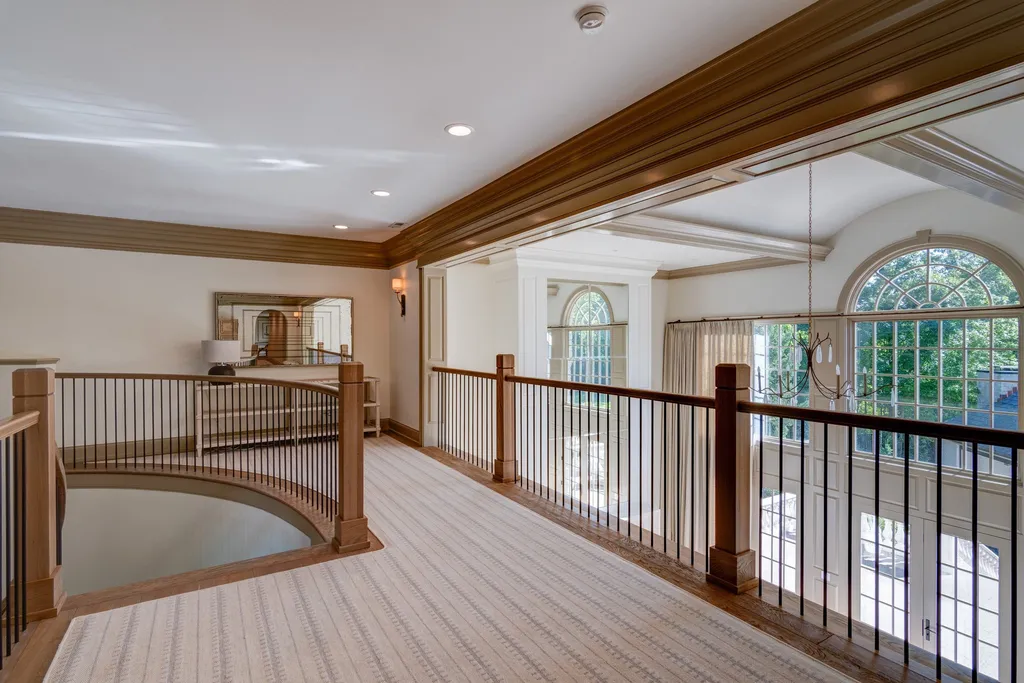 11101 Hawthorn Ridge Home in Fishers, Indiana. Explore the breathtaking elegance of 11101 Hawthorn Ridge, a custom-designed estate in Hamilton Proper. Nestled on over 6 acres of meticulously landscaped grounds, this gated residence offers unparalleled privacy and sophistication.