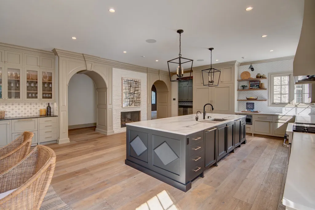 11101 Hawthorn Ridge Home in Fishers, Indiana. Explore the breathtaking elegance of 11101 Hawthorn Ridge, a custom-designed estate in Hamilton Proper. Nestled on over 6 acres of meticulously landscaped grounds, this gated residence offers unparalleled privacy and sophistication.