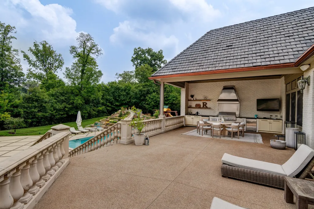 11101 Hawthorn Ridge Home in Fishers, Indiana. Explore the breathtaking elegance of 11101 Hawthorn Ridge, a custom-designed estate in Hamilton Proper. Nestled on over 6 acres of meticulously landscaped grounds, this gated residence offers unparalleled privacy and sophistication.