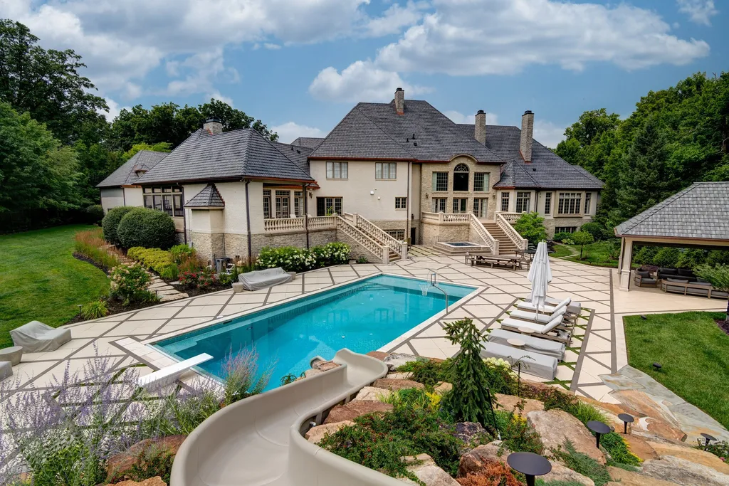 11101 Hawthorn Ridge Home in Fishers, Indiana. Explore the breathtaking elegance of 11101 Hawthorn Ridge, a custom-designed estate in Hamilton Proper. Nestled on over 6 acres of meticulously landscaped grounds, this gated residence offers unparalleled privacy and sophistication.