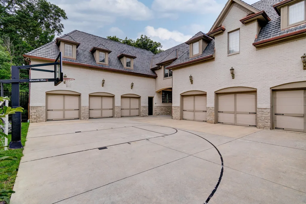 11101 Hawthorn Ridge Home in Fishers, Indiana. Explore the breathtaking elegance of 11101 Hawthorn Ridge, a custom-designed estate in Hamilton Proper. Nestled on over 6 acres of meticulously landscaped grounds, this gated residence offers unparalleled privacy and sophistication.