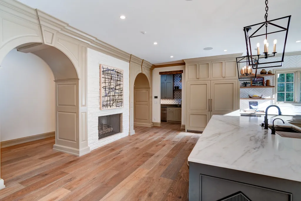 11101 Hawthorn Ridge Home in Fishers, Indiana. Explore the breathtaking elegance of 11101 Hawthorn Ridge, a custom-designed estate in Hamilton Proper. Nestled on over 6 acres of meticulously landscaped grounds, this gated residence offers unparalleled privacy and sophistication.
