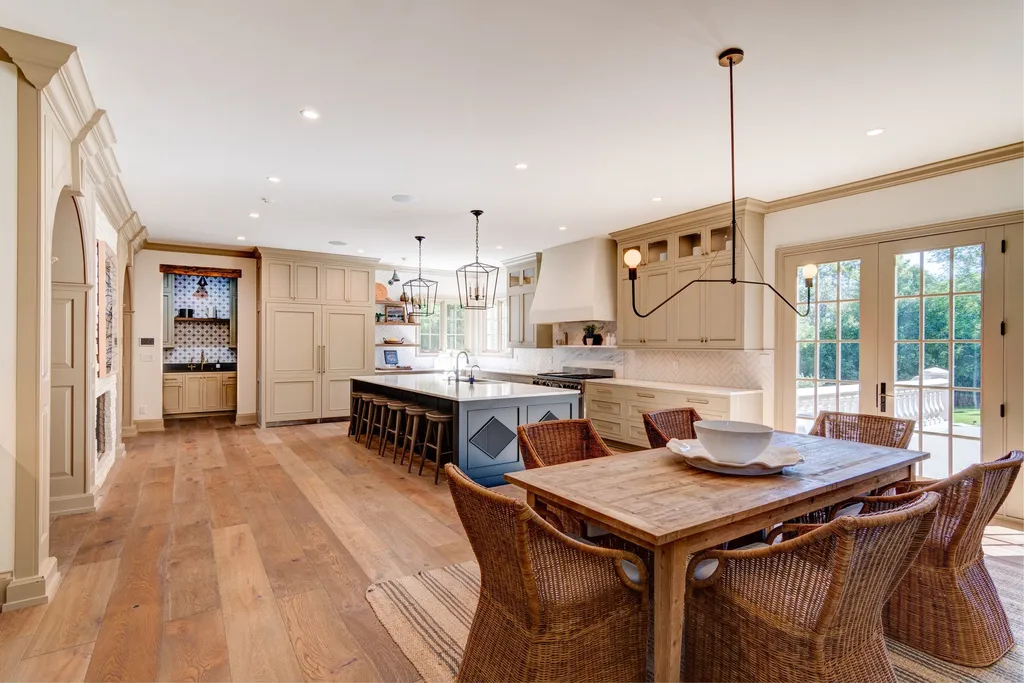 11101 Hawthorn Ridge Home in Fishers, Indiana. Explore the breathtaking elegance of 11101 Hawthorn Ridge, a custom-designed estate in Hamilton Proper. Nestled on over 6 acres of meticulously landscaped grounds, this gated residence offers unparalleled privacy and sophistication.