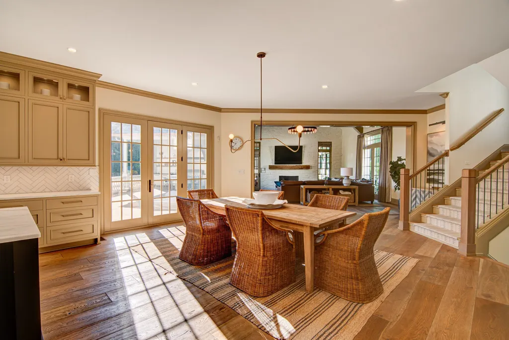 11101 Hawthorn Ridge Home in Fishers, Indiana. Explore the breathtaking elegance of 11101 Hawthorn Ridge, a custom-designed estate in Hamilton Proper. Nestled on over 6 acres of meticulously landscaped grounds, this gated residence offers unparalleled privacy and sophistication.