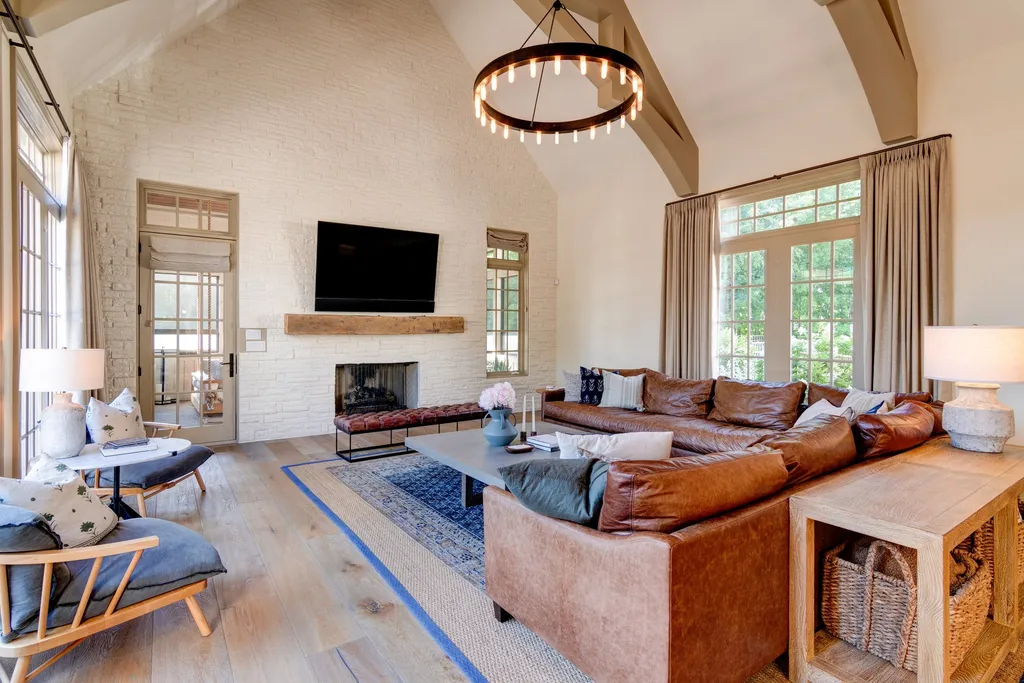 11101 Hawthorn Ridge Home in Fishers, Indiana. Explore the breathtaking elegance of 11101 Hawthorn Ridge, a custom-designed estate in Hamilton Proper. Nestled on over 6 acres of meticulously landscaped grounds, this gated residence offers unparalleled privacy and sophistication.