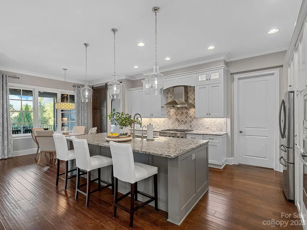 147 Torrence Chapel Road Home in Mooresville, North Carolina. Prepare to be amazed by this award-winning home designed and built by Arthur Rutenberg Homes. Set on over an acre of meticulously landscaped land, this stunning residence is a true masterpiece that you won't want to miss.