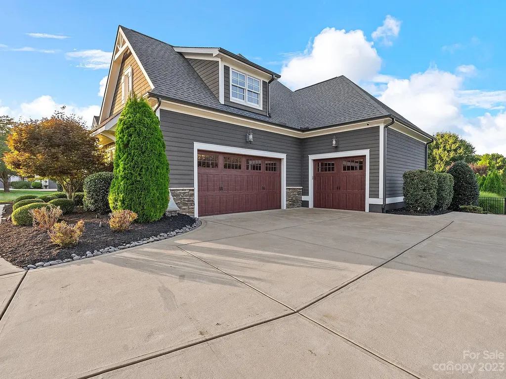 147 Torrence Chapel Road Home in Mooresville, North Carolina. Prepare to be amazed by this award-winning home designed and built by Arthur Rutenberg Homes. Set on over an acre of meticulously landscaped land, this stunning residence is a true masterpiece that you won't want to miss.