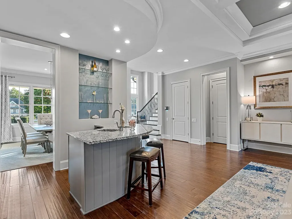 147 Torrence Chapel Road Home in Mooresville, North Carolina. Prepare to be amazed by this award-winning home designed and built by Arthur Rutenberg Homes. Set on over an acre of meticulously landscaped land, this stunning residence is a true masterpiece that you won't want to miss.