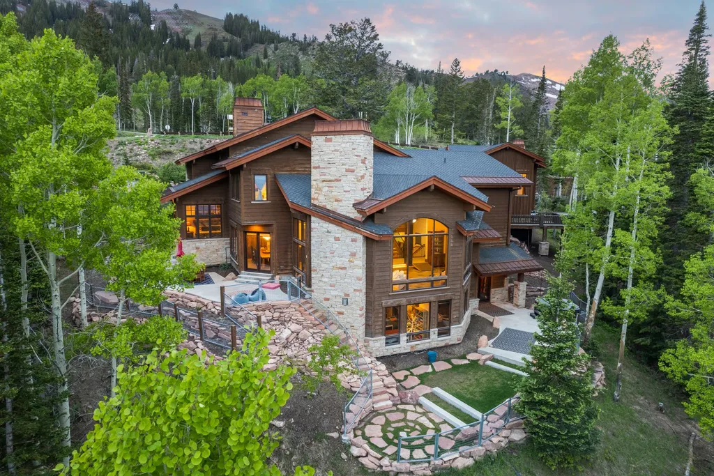 147 White Pine Canyon Road Home in Park City, Utah. Perched atop The Colony, Park City's premier gated ski-in ski-out neighborhood, this quintessential mountain home offers unmatched privacy, ski access, and breathtaking views. Set on 4.6 secluded acres, this property provides a tranquil escape for friends and families to embrace the mountain lifestyle. 