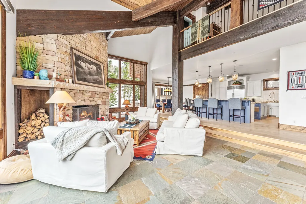 147 White Pine Canyon Road Home in Park City, Utah. Perched atop The Colony, Park City's premier gated ski-in ski-out neighborhood, this quintessential mountain home offers unmatched privacy, ski access, and breathtaking views. Set on 4.6 secluded acres, this property provides a tranquil escape for friends and families to embrace the mountain lifestyle. 