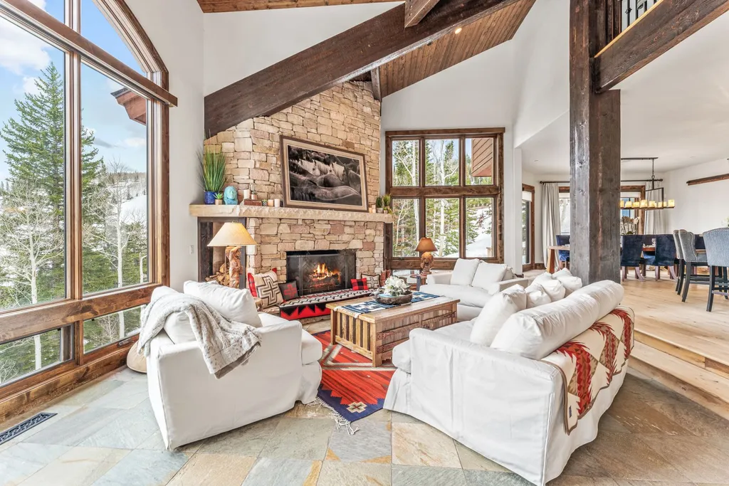 147 White Pine Canyon Road Home in Park City, Utah. Perched atop The Colony, Park City's premier gated ski-in ski-out neighborhood, this quintessential mountain home offers unmatched privacy, ski access, and breathtaking views. Set on 4.6 secluded acres, this property provides a tranquil escape for friends and families to embrace the mountain lifestyle. 