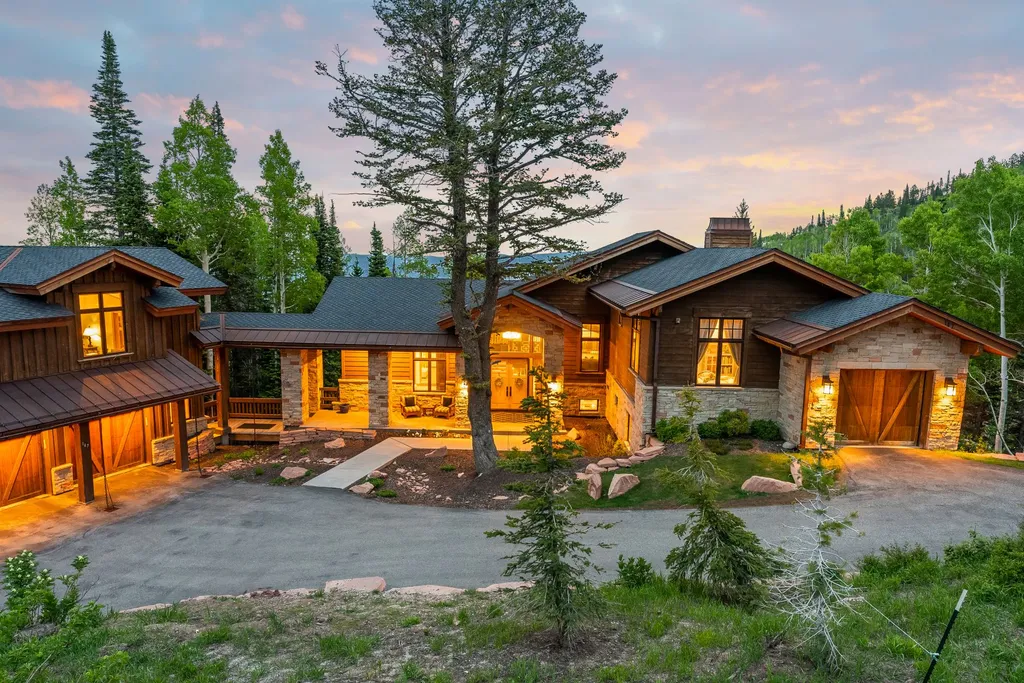 147 White Pine Canyon Road Home in Park City, Utah. Perched atop The Colony, Park City's premier gated ski-in ski-out neighborhood, this quintessential mountain home offers unmatched privacy, ski access, and breathtaking views. Set on 4.6 secluded acres, this property provides a tranquil escape for friends and families to embrace the mountain lifestyle. 
