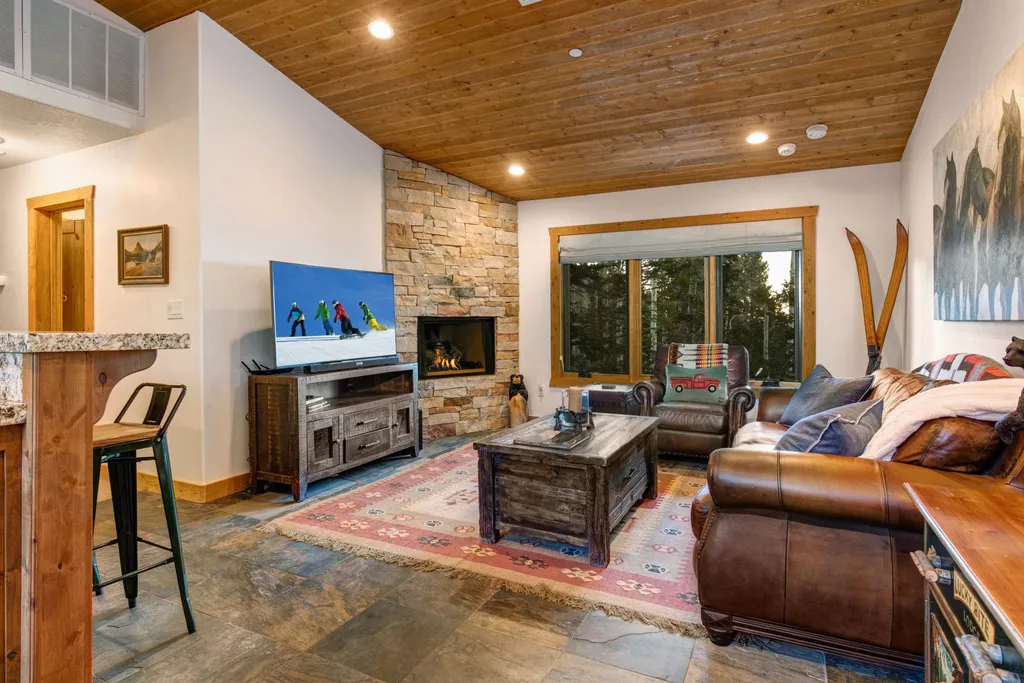 147 White Pine Canyon Road Home in Park City, Utah. Perched atop The Colony, Park City's premier gated ski-in ski-out neighborhood, this quintessential mountain home offers unmatched privacy, ski access, and breathtaking views. Set on 4.6 secluded acres, this property provides a tranquil escape for friends and families to embrace the mountain lifestyle. 