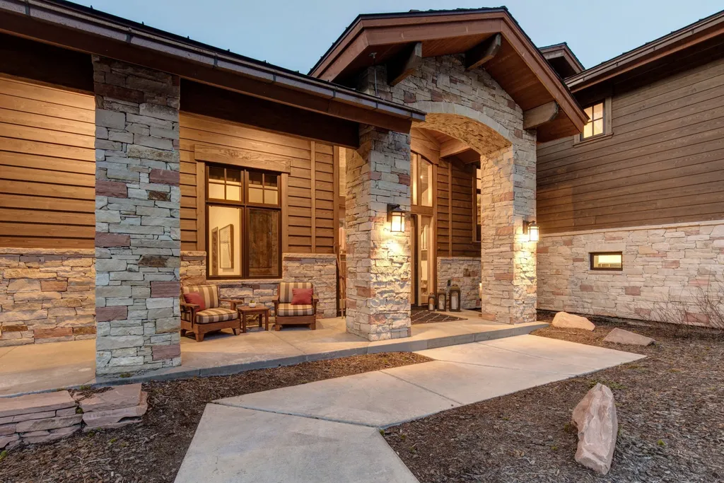 147 White Pine Canyon Road Home in Park City, Utah. Perched atop The Colony, Park City's premier gated ski-in ski-out neighborhood, this quintessential mountain home offers unmatched privacy, ski access, and breathtaking views. Set on 4.6 secluded acres, this property provides a tranquil escape for friends and families to embrace the mountain lifestyle. 
