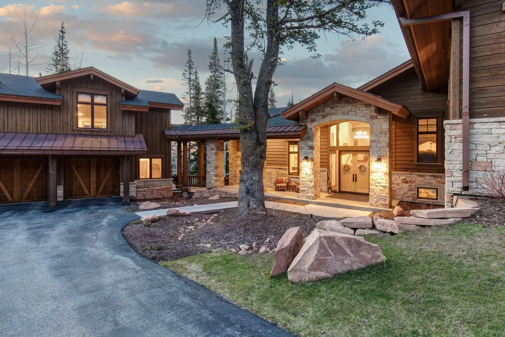 147 White Pine Canyon Road Home in Park City, Utah. Perched atop The Colony, Park City's premier gated ski-in ski-out neighborhood, this quintessential mountain home offers unmatched privacy, ski access, and breathtaking views. Set on 4.6 secluded acres, this property provides a tranquil escape for friends and families to embrace the mountain lifestyle. 