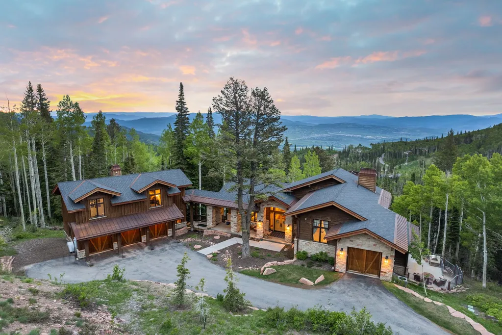 147 White Pine Canyon Road Home in Park City, Utah. Perched atop The Colony, Park City's premier gated ski-in ski-out neighborhood, this quintessential mountain home offers unmatched privacy, ski access, and breathtaking views. Set on 4.6 secluded acres, this property provides a tranquil escape for friends and families to embrace the mountain lifestyle. 