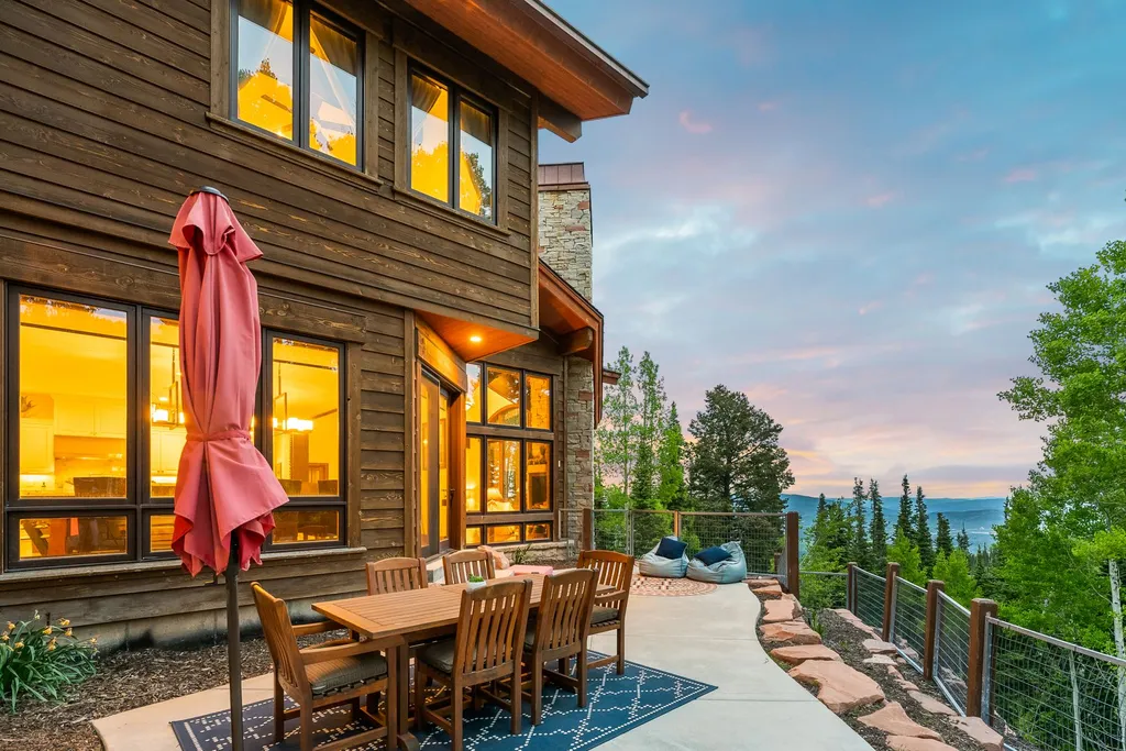 147 White Pine Canyon Road Home in Park City, Utah. Perched atop The Colony, Park City's premier gated ski-in ski-out neighborhood, this quintessential mountain home offers unmatched privacy, ski access, and breathtaking views. Set on 4.6 secluded acres, this property provides a tranquil escape for friends and families to embrace the mountain lifestyle. 