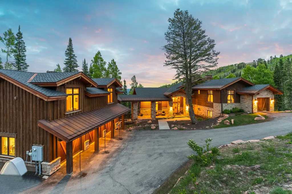 147 White Pine Canyon Road Home in Park City, Utah. Perched atop The Colony, Park City's premier gated ski-in ski-out neighborhood, this quintessential mountain home offers unmatched privacy, ski access, and breathtaking views. Set on 4.6 secluded acres, this property provides a tranquil escape for friends and families to embrace the mountain lifestyle. 