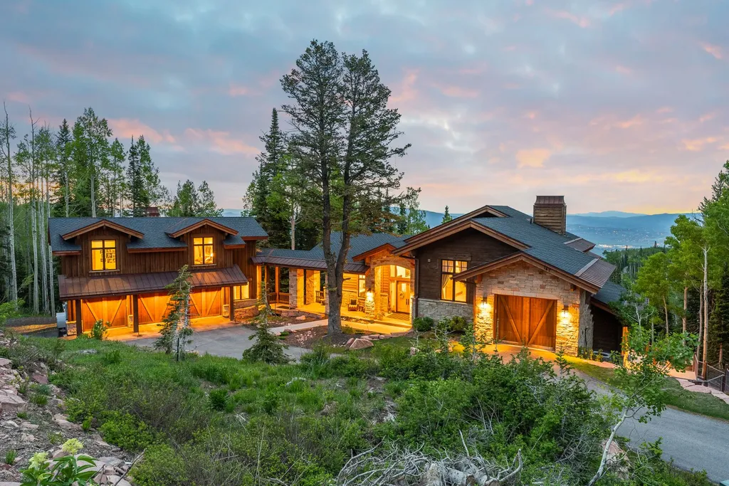 147 White Pine Canyon Road Home in Park City, Utah. Perched atop The Colony, Park City's premier gated ski-in ski-out neighborhood, this quintessential mountain home offers unmatched privacy, ski access, and breathtaking views. Set on 4.6 secluded acres, this property provides a tranquil escape for friends and families to embrace the mountain lifestyle. 