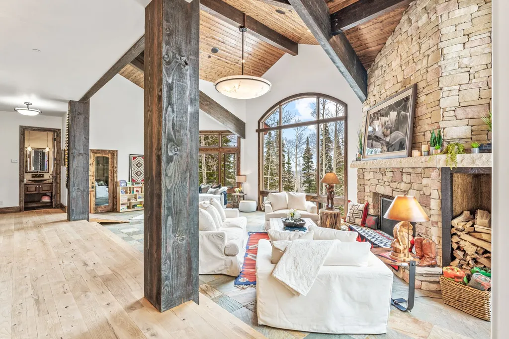147 White Pine Canyon Road Home in Park City, Utah. Perched atop The Colony, Park City's premier gated ski-in ski-out neighborhood, this quintessential mountain home offers unmatched privacy, ski access, and breathtaking views. Set on 4.6 secluded acres, this property provides a tranquil escape for friends and families to embrace the mountain lifestyle. 