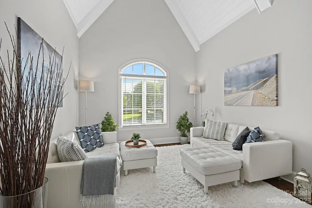 This stunning home in Providence Downs South offers luxury resort living with spa-like amenities, perfect for entertaining and relaxing. It has 5 bedrooms, 4 full baths, and 3 half baths, plus a 4-car garage with epoxy floor. The kitchen has a huge island with Wolf & Subzero appliances, and the backyard has a heated pool, hot tub, and pool house with sauna. 