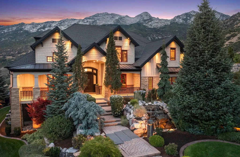 1643 E Box Elder Drive Home in Alpine, Utah. Few homes capture the majesty and beauty of Alpine's surrounding mountains like this one. This former parade of homes prize winner boasts panoramic views from every room. Impeccable attention to detail is evident throughout, with beautiful wood trim accentuating the warmth of the gathering areas. 