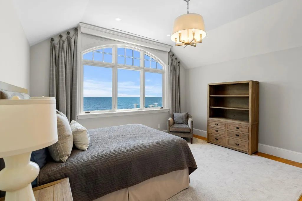17 Straws Point Home in Rye, New Hampshire. Welcome to an extraordinary oceanfront estate located on the prestigious Straw's Point in Rye, New Hampshire—a property that defines opulence and luxury living. Situated at 17 Straw's Point, this magnificent residence boasts over 10,000 square feet of sheer grandeur. 