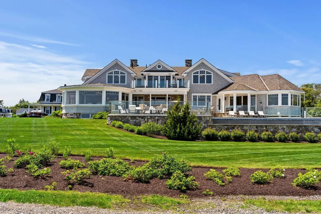 17 Straws Point Home in Rye, New Hampshire. Welcome to an extraordinary oceanfront estate located on the prestigious Straw's Point in Rye, New Hampshire—a property that defines opulence and luxury living. Situated at 17 Straw's Point, this magnificent residence boasts over 10,000 square feet of sheer grandeur. 