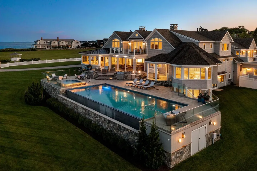 17 Straws Point Home in Rye, New Hampshire. Welcome to an extraordinary oceanfront estate located on the prestigious Straw's Point in Rye, New Hampshire—a property that defines opulence and luxury living. Situated at 17 Straw's Point, this magnificent residence boasts over 10,000 square feet of sheer grandeur. 