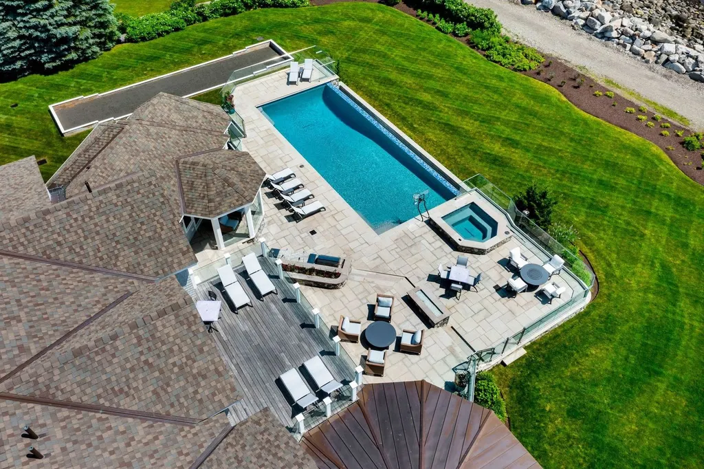 17 Straws Point Home in Rye, New Hampshire. Welcome to an extraordinary oceanfront estate located on the prestigious Straw's Point in Rye, New Hampshire—a property that defines opulence and luxury living. Situated at 17 Straw's Point, this magnificent residence boasts over 10,000 square feet of sheer grandeur. 