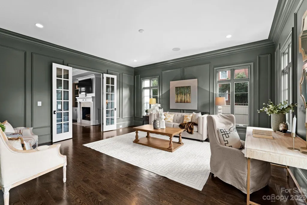 This stately transitional Myers Park home is situated on a large lot and features a spacious floor plan, a gourmet kitchen, a large pool with hot tub and water features, a newly built pool house with full bathroom, laundry, and outdoor patio with fireplace, and a newly built sport court that can act as a basketball court, pickleball court, volley ball, and tennis court. It is conveniently located to everything!