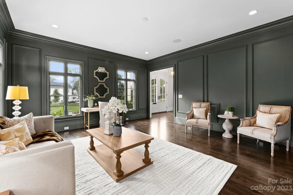 This stately transitional Myers Park home is situated on a large lot and features a spacious floor plan, a gourmet kitchen, a large pool with hot tub and water features, a newly built pool house with full bathroom, laundry, and outdoor patio with fireplace, and a newly built sport court that can act as a basketball court, pickleball court, volley ball, and tennis court. It is conveniently located to everything!