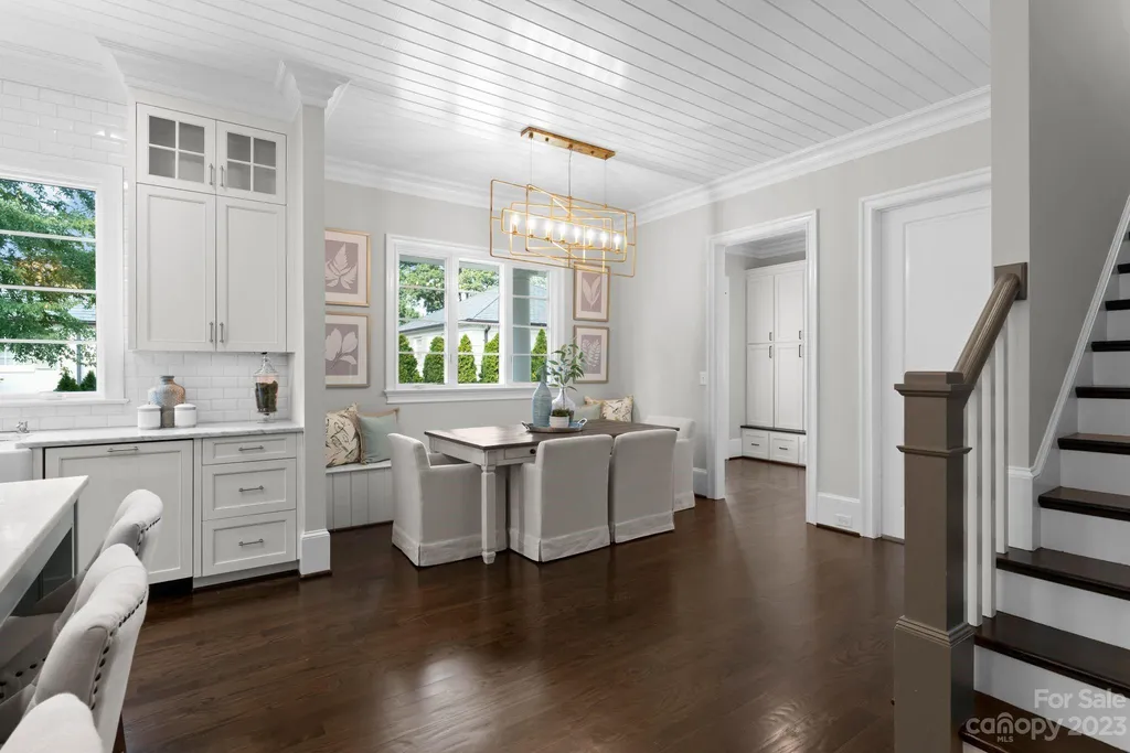 This stately transitional Myers Park home is situated on a large lot and features a spacious floor plan, a gourmet kitchen, a large pool with hot tub and water features, a newly built pool house with full bathroom, laundry, and outdoor patio with fireplace, and a newly built sport court that can act as a basketball court, pickleball court, volley ball, and tennis court. It is conveniently located to everything!