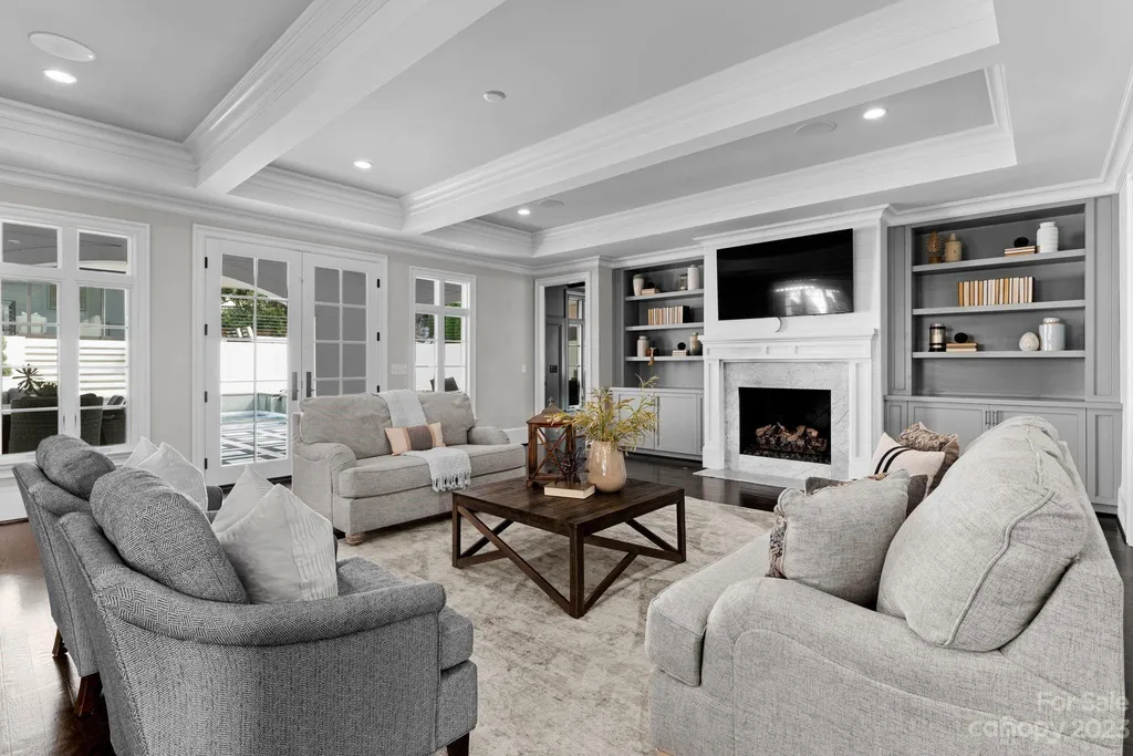 This stately transitional Myers Park home is situated on a large lot and features a spacious floor plan, a gourmet kitchen, a large pool with hot tub and water features, a newly built pool house with full bathroom, laundry, and outdoor patio with fireplace, and a newly built sport court that can act as a basketball court, pickleball court, volley ball, and tennis court. It is conveniently located to everything!