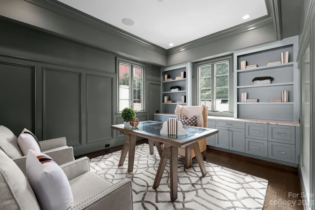 This stately transitional Myers Park home is situated on a large lot and features a spacious floor plan, a gourmet kitchen, a large pool with hot tub and water features, a newly built pool house with full bathroom, laundry, and outdoor patio with fireplace, and a newly built sport court that can act as a basketball court, pickleball court, volley ball, and tennis court. It is conveniently located to everything!