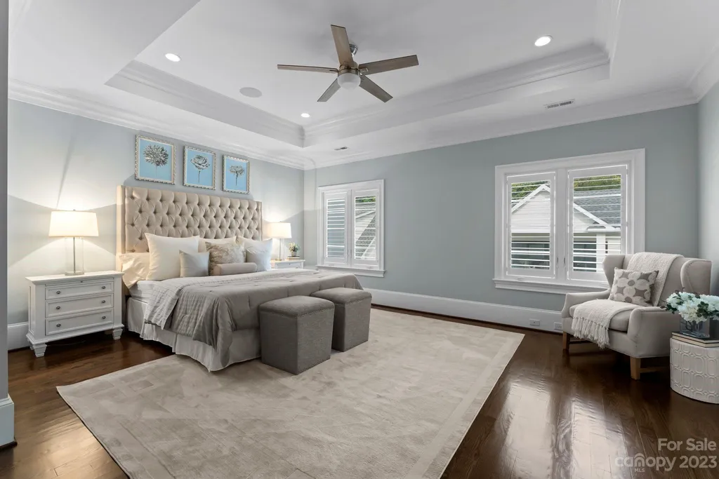 This stately transitional Myers Park home is situated on a large lot and features a spacious floor plan, a gourmet kitchen, a large pool with hot tub and water features, a newly built pool house with full bathroom, laundry, and outdoor patio with fireplace, and a newly built sport court that can act as a basketball court, pickleball court, volley ball, and tennis court. It is conveniently located to everything!