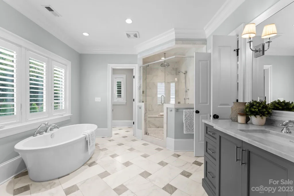 This stately transitional Myers Park home is situated on a large lot and features a spacious floor plan, a gourmet kitchen, a large pool with hot tub and water features, a newly built pool house with full bathroom, laundry, and outdoor patio with fireplace, and a newly built sport court that can act as a basketball court, pickleball court, volley ball, and tennis court. It is conveniently located to everything!